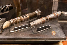 Load image into Gallery viewer, Galaxy&#39;s Edge Lightsaber Hilt Stand Displayed in Case